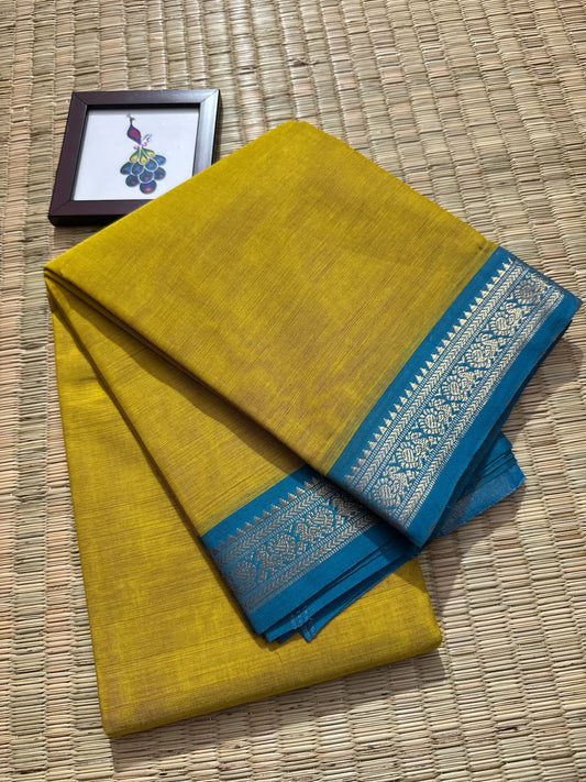 Yellow Elegant Kanchi Cotton Saree with Blue Rich Zari Border & Tassel Pallu