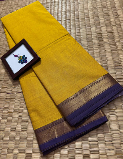 Yellow Elegant Kanchi Cotton Saree with Purple Rich Zari Border & Tassel Pallu
