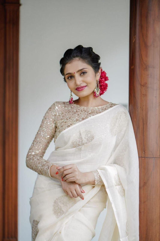 Premium Kerala Linen Off White Saree with Woven Zari Motifs & Heavy Sequin Blouse