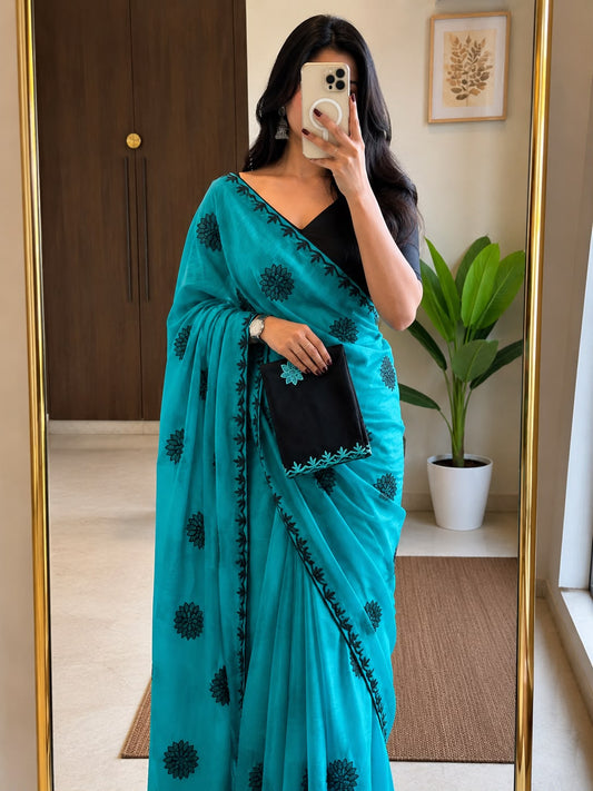 Turquoise Blue Star Georgette Embroidered Saree with Floral Motifs & Running Blouse