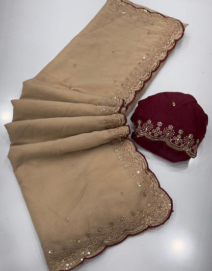 Elegant Beige Star Georgette Saree with Sequence Embroidered Border & Contrast Blouse