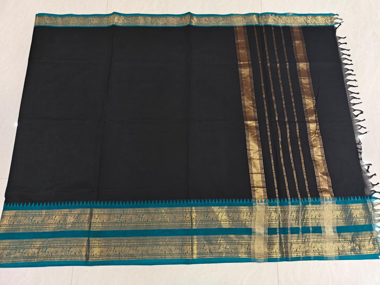 Pure Kanchi Cotton Black Saree with Teal Blue Elephant Zari Border