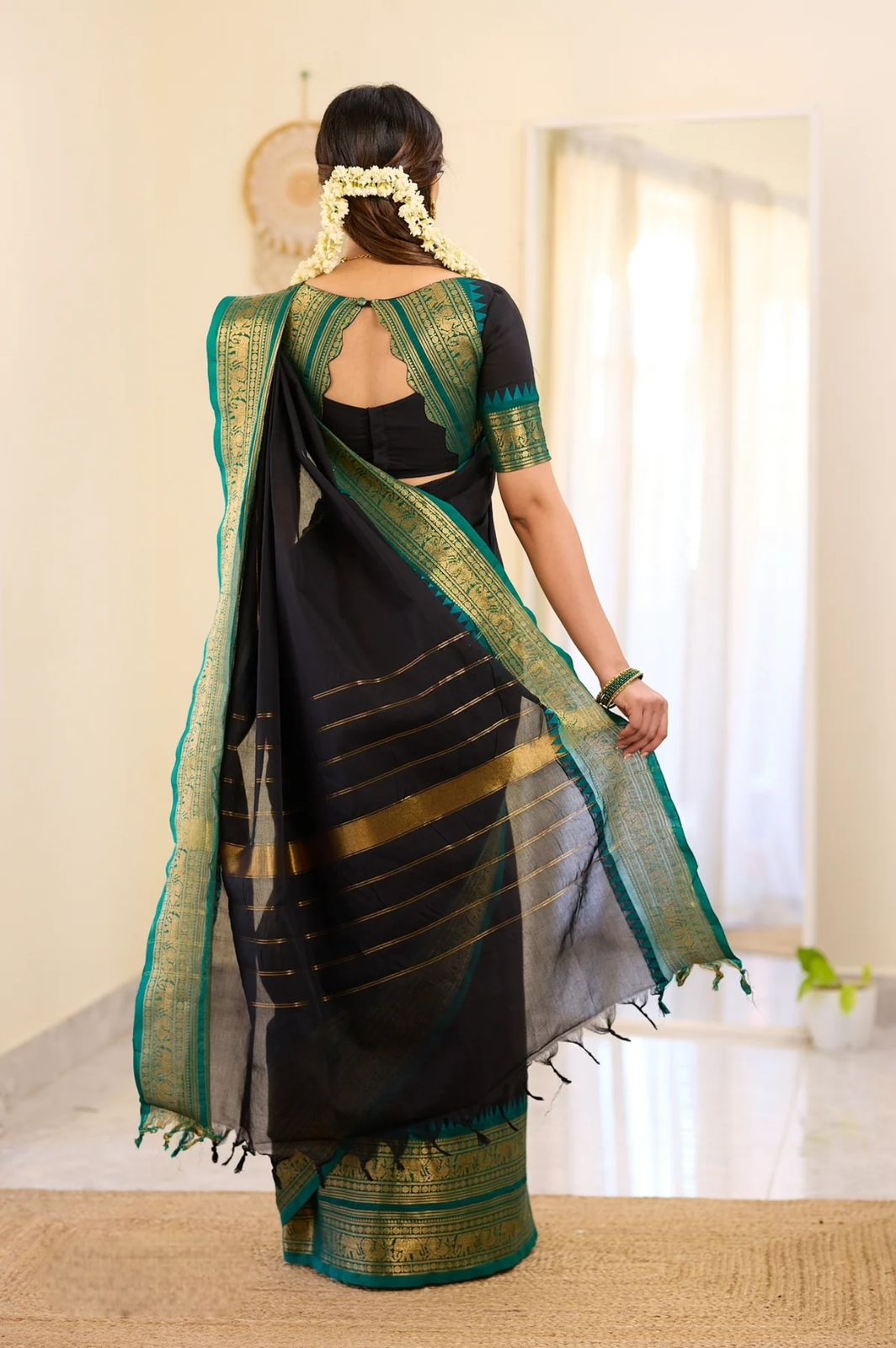 Pure Kanchi Cotton Black Saree with Teal Blue Elephant Zari Border